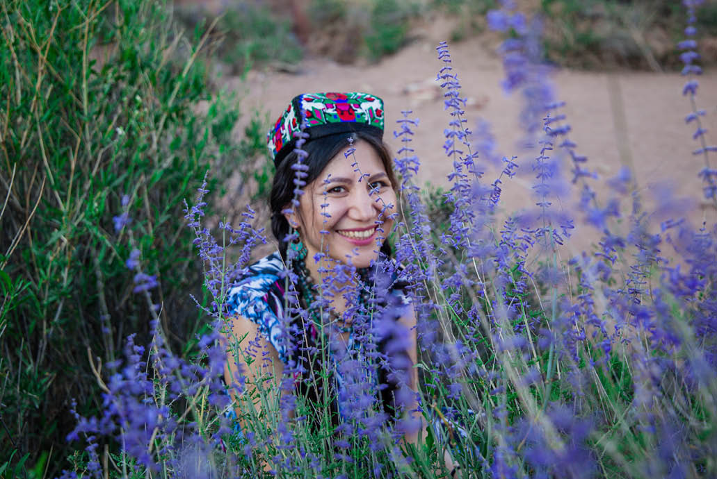 A Beautiful Model Amongst the Lavender Flowers at Fairy Tale Canyon, Kyrgyzstan. 